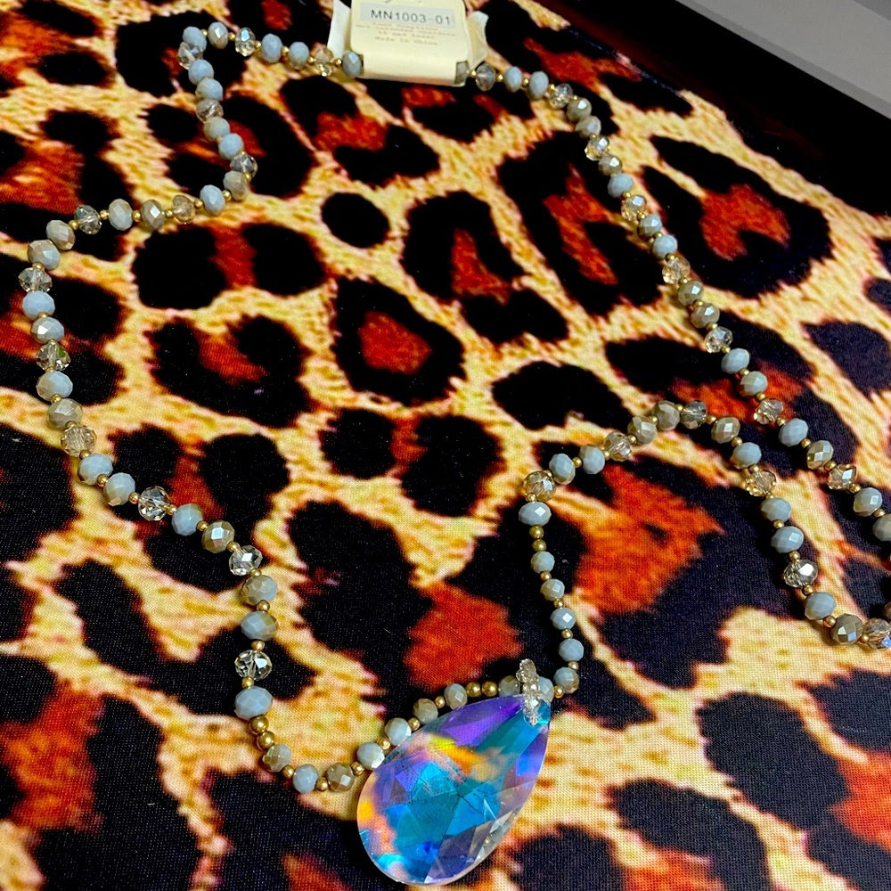 Radiant Crystal Necklace about 18 in long purplish gray with clear& gold beads